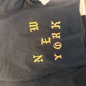 Black Long Sleeve Shirt with Gold Gothic Lettering - Pablo Kanye